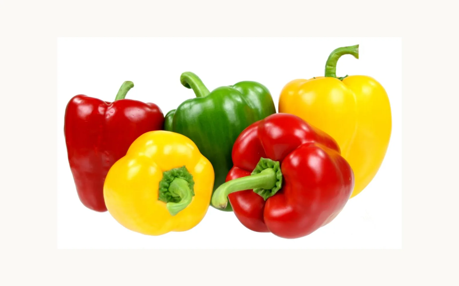 Red, green and yellow bell peppers